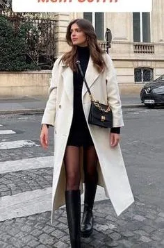 Winter date night outfit: white coat over black dress street look