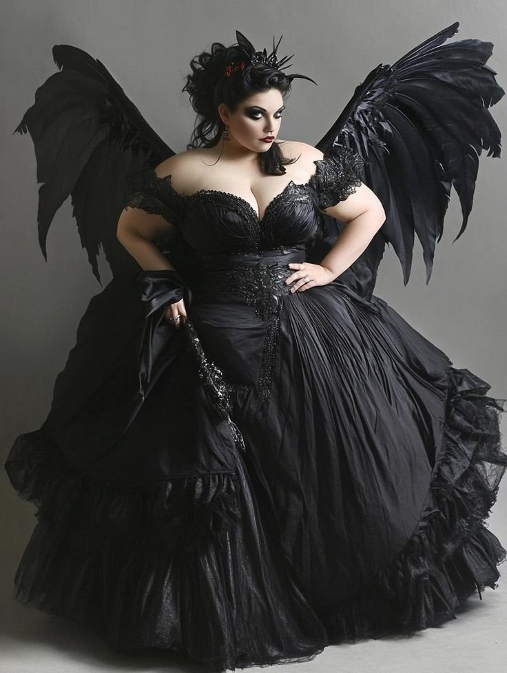 Plus size witchy outfit: black gown with wings